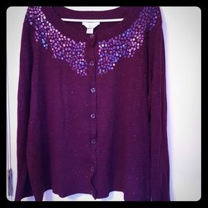 Very pretty,  glitzy sweater, light weight.